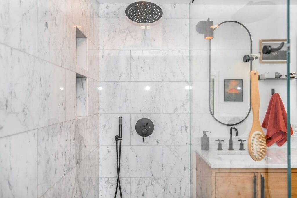 Modern bathroom shower with hot water serviced by a Las Vegas plumber